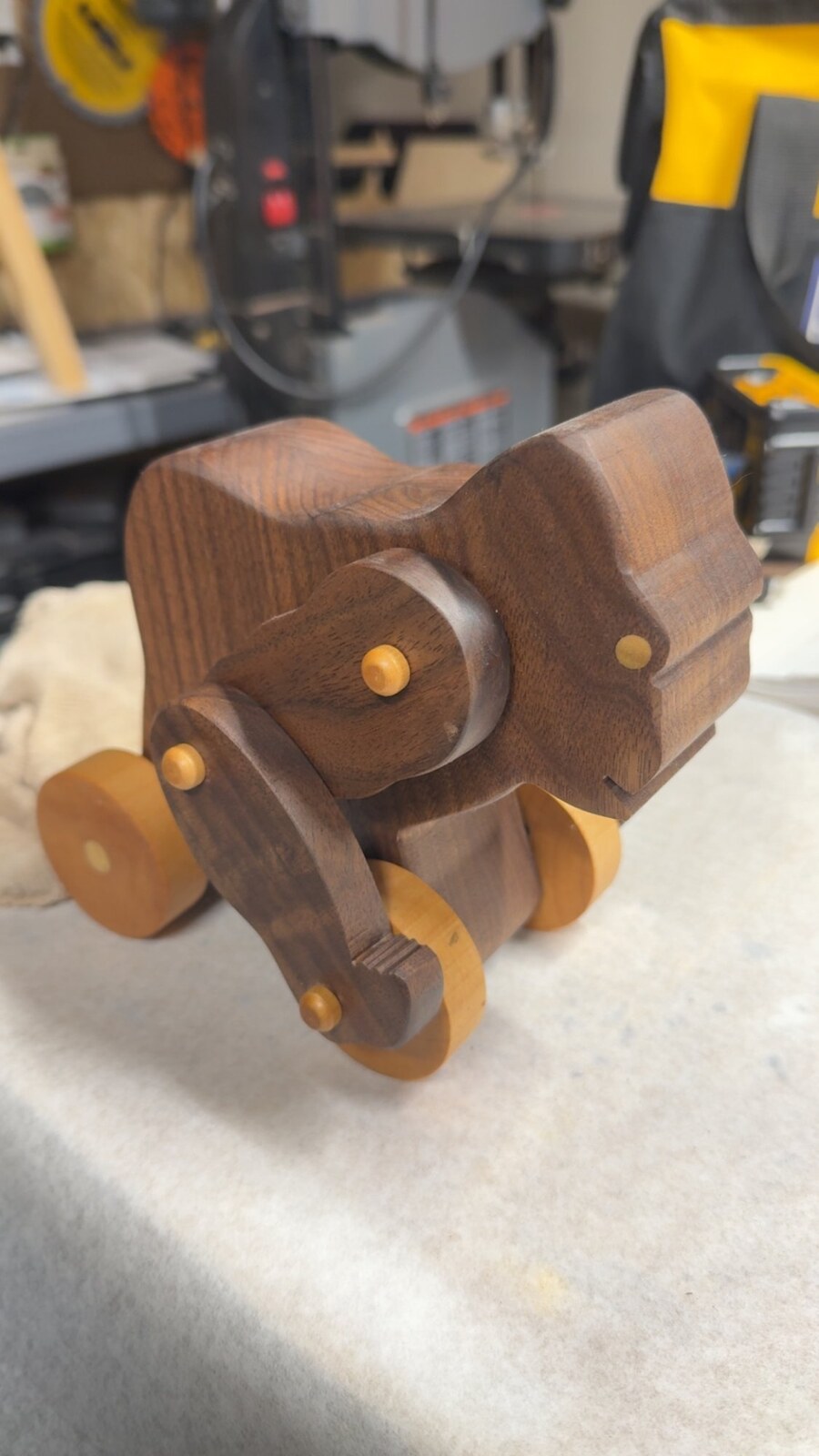 Walnut horse pull toy with maple wheels