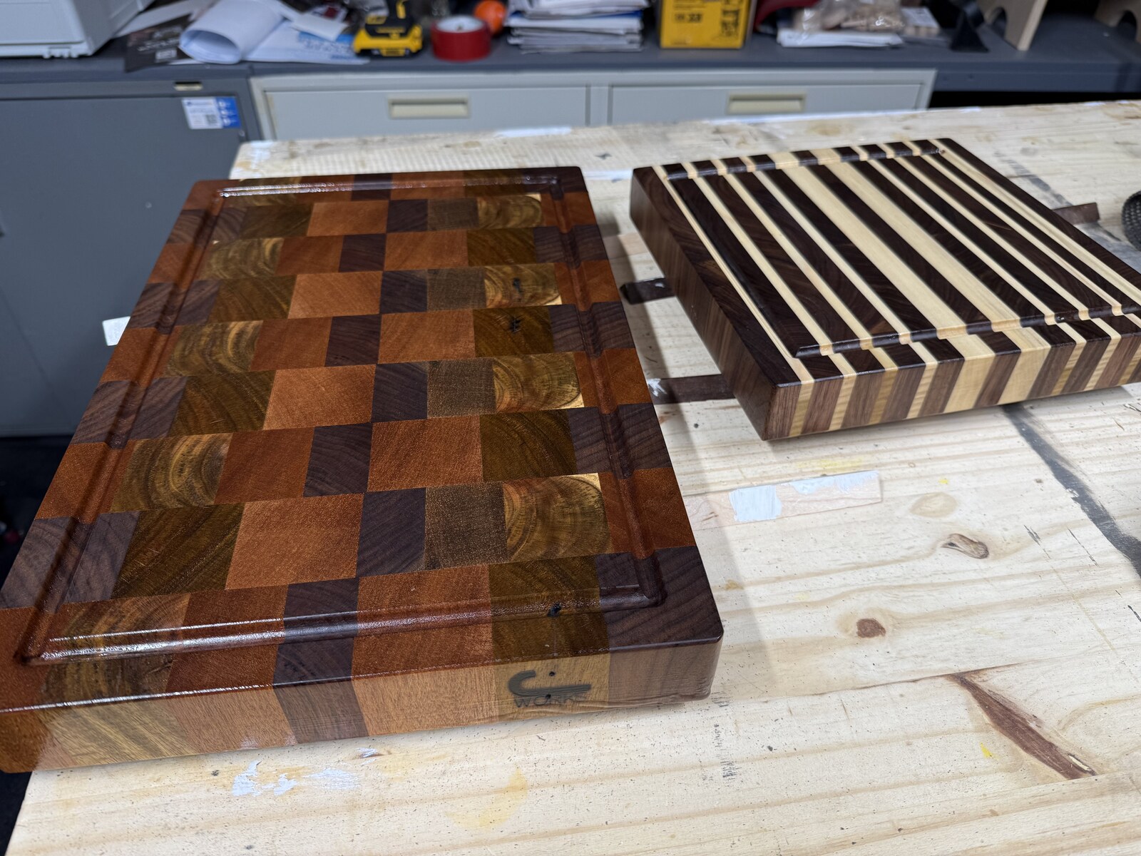 Two cutting boards side by side on workbench