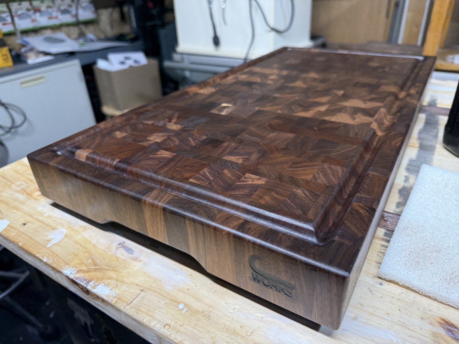 Walnut end-grain board with Lazy J brand mark